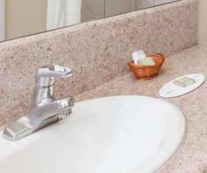 Sink vanity with complimentary toiletries